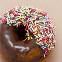 10399   Delicious fresh chocolate donut with sprinkles