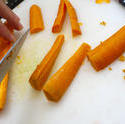 8484   Man preparing fresh carrots