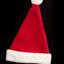 10568   Red and White Christmas Hat on Black Background