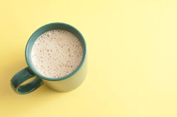 10436   Mug of freshly poured frothy coffee