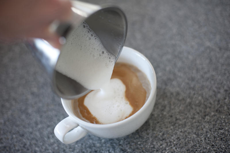 Barista making cappuccino. Unrecognizable.