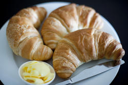 8457   Three golden flaky croissants
