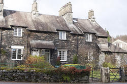 8761   Picturesque stone cottage at Skeklwith Bridge