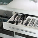 10658   Open cutlery drawer in a kitchen cabinet