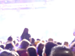 10585   High key crowd of young people at a dance party