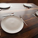 8842   Wooden dining table with four place settings