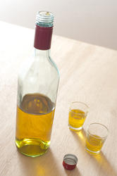 11598   Bottle of whiskey with two full glasses
