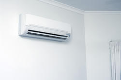 10659   Domestic Air Conditioner Hanging on White Wall