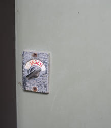 10756   Closed door with an engaged sign