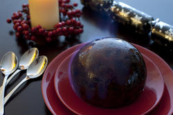 8643   Flaming Christmas pudding served at the table