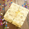 11452   Yellow Birthday Gift on Table with Confetti