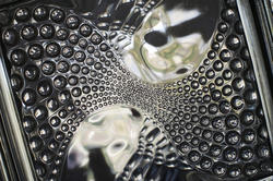 10921   Detail of Glass Block with Swirling Bubble Pattern