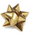 8634   Shiny decorative bow made of golden ribbon