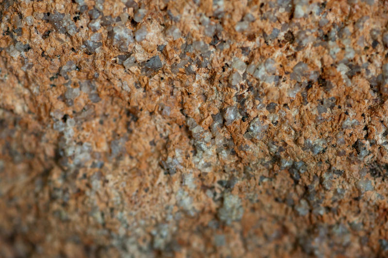 Close Up Detail of Granite Rock Showing Texture and Variations in Rock Compound