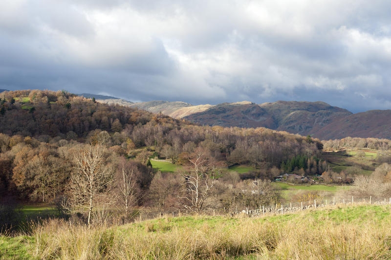 Scenic landscape view of the Langdales, or Great Langdale, which is a valley in the Lake District National Park in Cumbria and a popular tourist destination