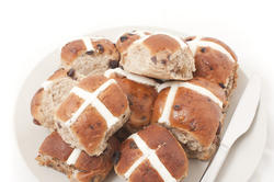 10614   Fresh Hot Cross Buns on a Plate Isolated on White