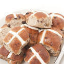 10614   Fresh Hot Cross Buns on a Plate Isolated on White