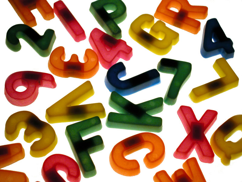 <p>Colourful childrens letters on a light board</p>