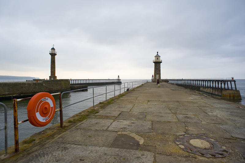 View at twin piers and the two navigation lighthouses, whitby, UK
