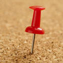 10814   Red Sharp Marker Pin Pinned on a Cork Board