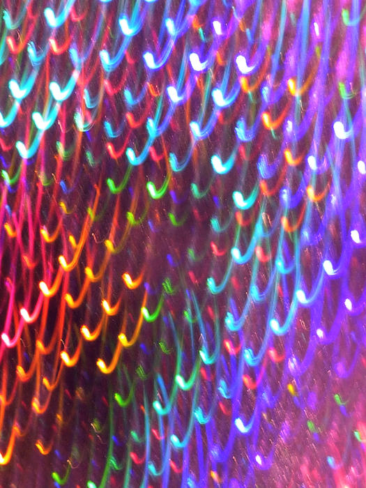 a colorful background of lights with motion trails
