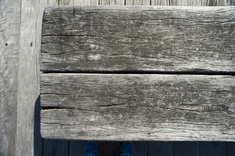 Close Up of Grey Weathered Wood Boards as Part of Old Structure Such as a Fence or Barn