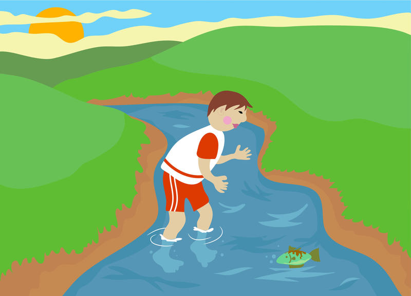 <p>Boy playing in a stream.</p>