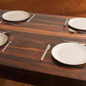 8844   Four place settings on a dinner table