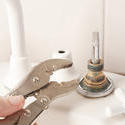 10176   Repairing a faucet with a mole grip pliers