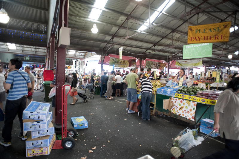 Random People Buying Products at the Public Fruit and Vegetable Market