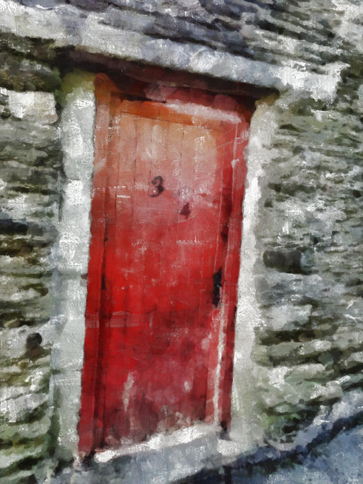 <p>A red door set in an old stone wall.</p>