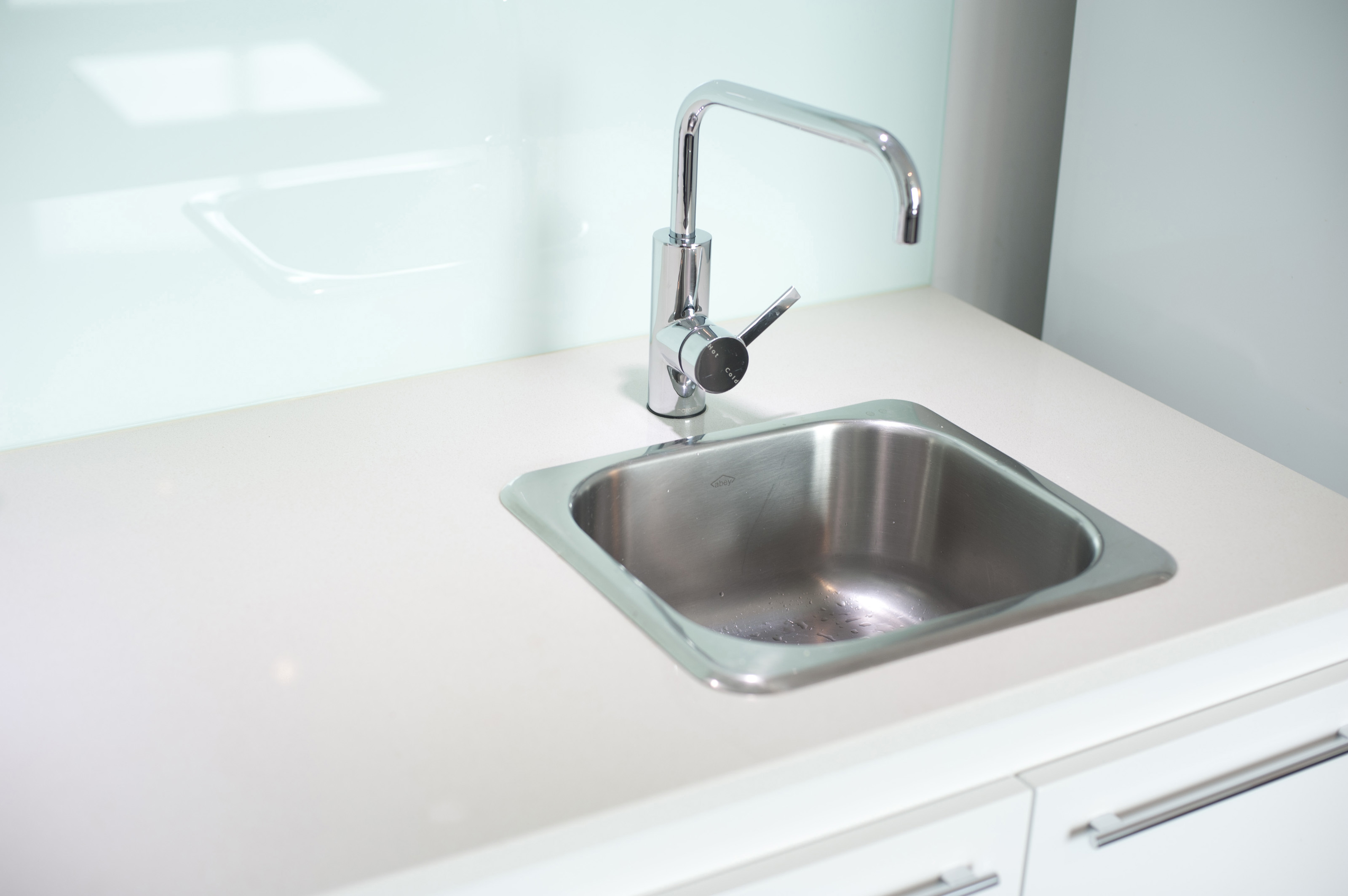 kitchen sink with faucet and handles