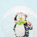 8672   Penguin in snowflakes floating in a snow globe