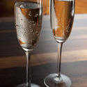 11641   Two flutes of sparkling white wine
