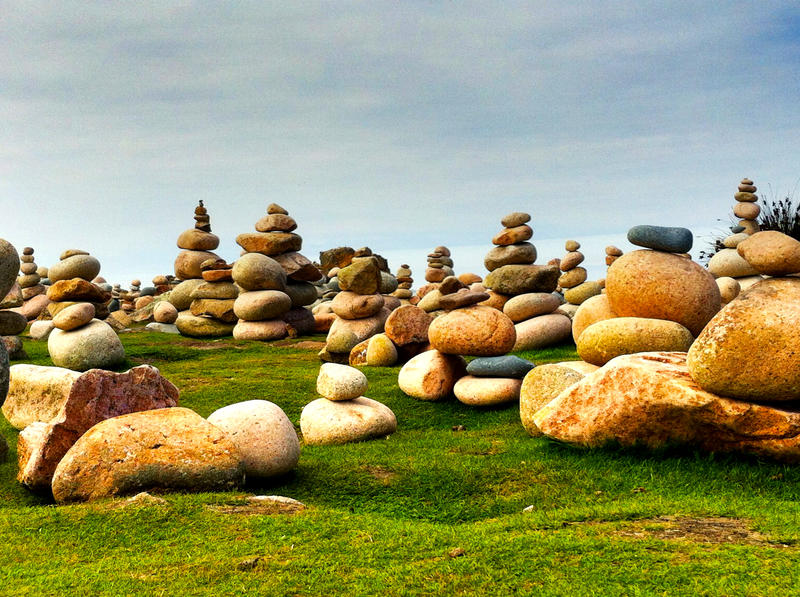 <p>Stones picked up from the beach and stacked together on the île de Brehat (near Paimpol in France, Bretagne)</p>