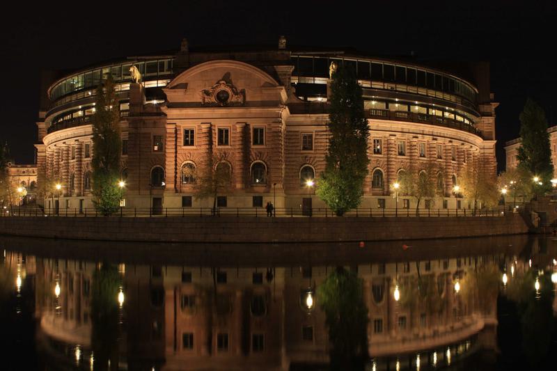 <p>Parliament Building in Stockholm, Sweden Reflected in Water in Late Evening</p>