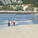 11003   Surfers at the Beach with their Surfing Boards