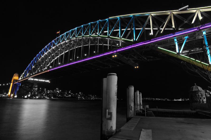 <p>Sydney CBD bridge lit up at night.</p>