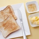 8450   White toast with butter and marmalade