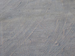 10935   Vehicle Tire Tracks Criss Crossing in Sand