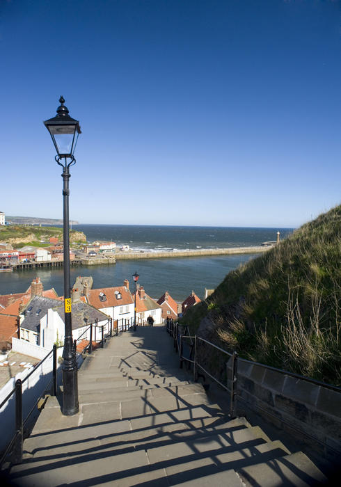 View over the harbour from the 199 steps that lead up from Whitby town to the St Marys Church on Tate Hill