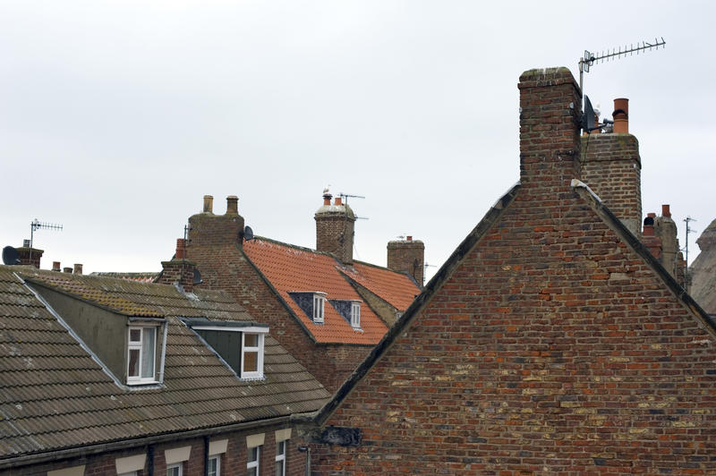 Whitby cottage roofs with traditional English roofing tiles and dormer windows