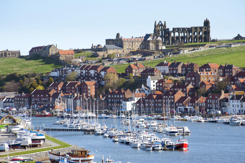 Scenic fishing Port and abbey ruins in Whitby, North Yorkshire