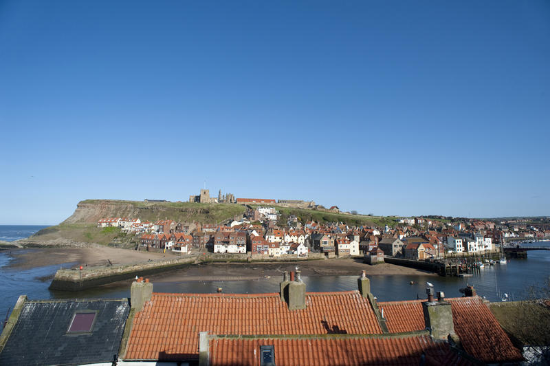 View of Tate Hill and St Marys Church above the town of Whitby which was used as the setting for Bram Stokers novel on Dracula