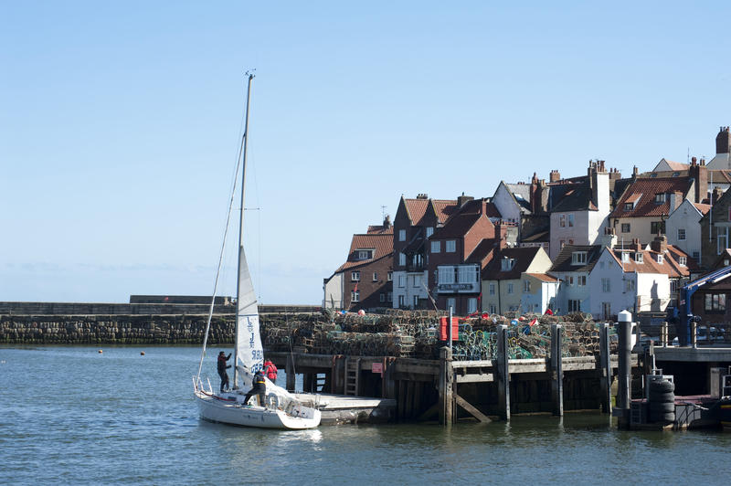 Sailing yacht against the blue sky background, whitby north yorkshire