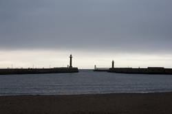 8057   Navigation lights on stone piers