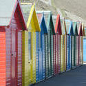 7865   Colourful wooden beach huts