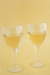 10470   Two glasses of white wine ready for celebration