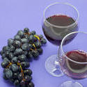 11628   Grapes on Red Background with Wine Glasses