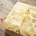 11416   Yellow Present on Wooden Table with Confetti